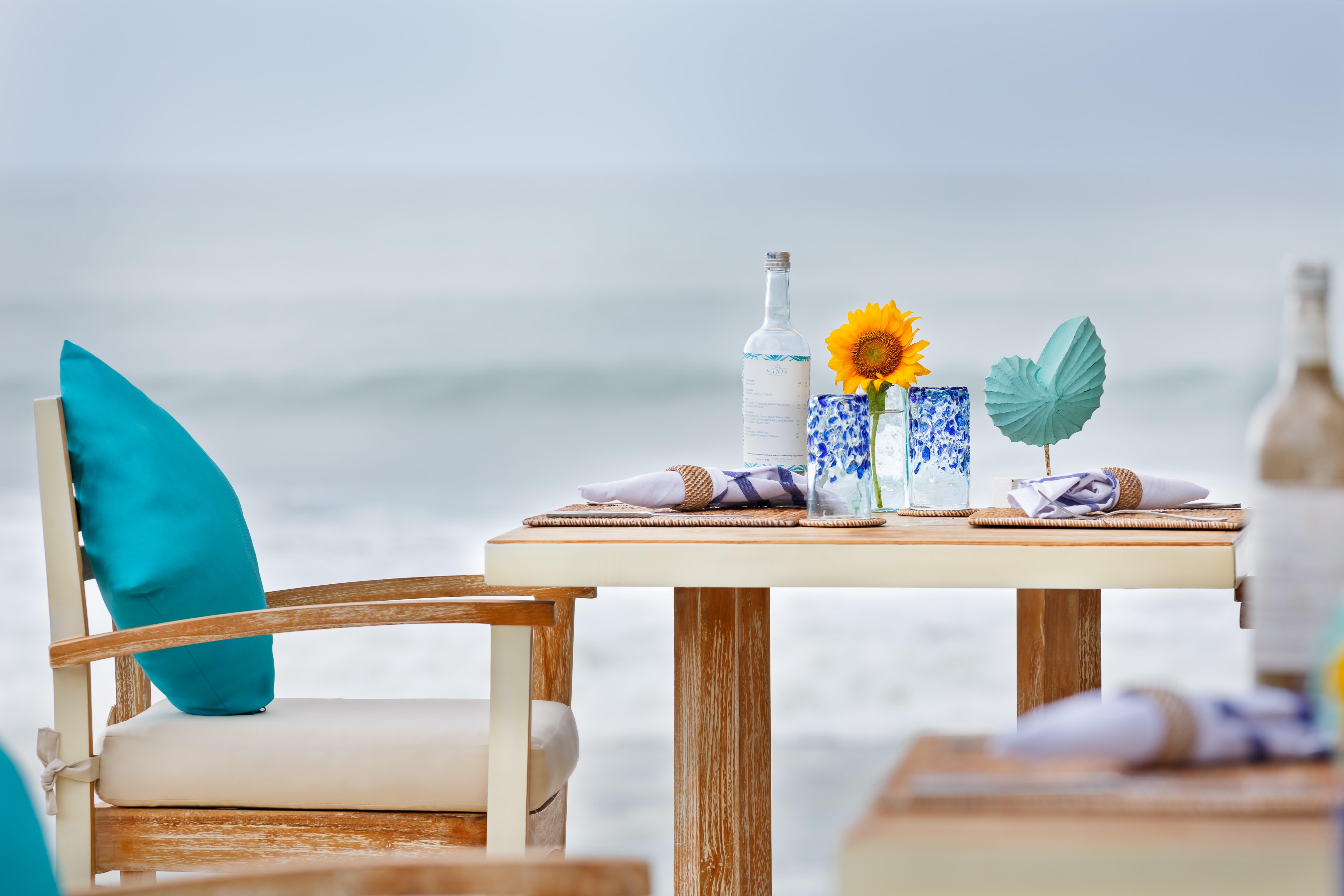 The Seminyak Beach Resort & Spa Экстерьер фото Beachfront dining at the resort